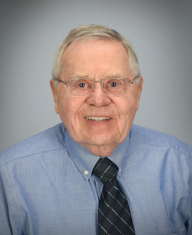 Headshot of Thomas J. Parins